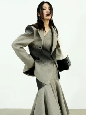 Gray ombre gradient quilted jacket styled with a coordinated fluted midi skirt in a tailored Korean streetwear outfit