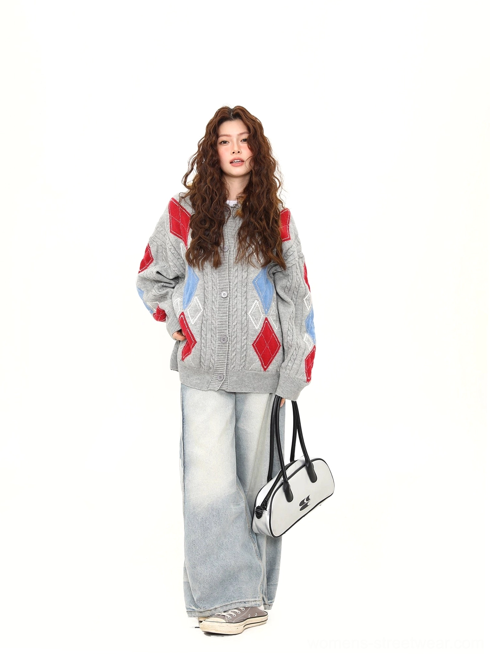 Gray oversized argyle knit cardigan side view showing diamond patterned sleeves ribbed hem and loose silhouette