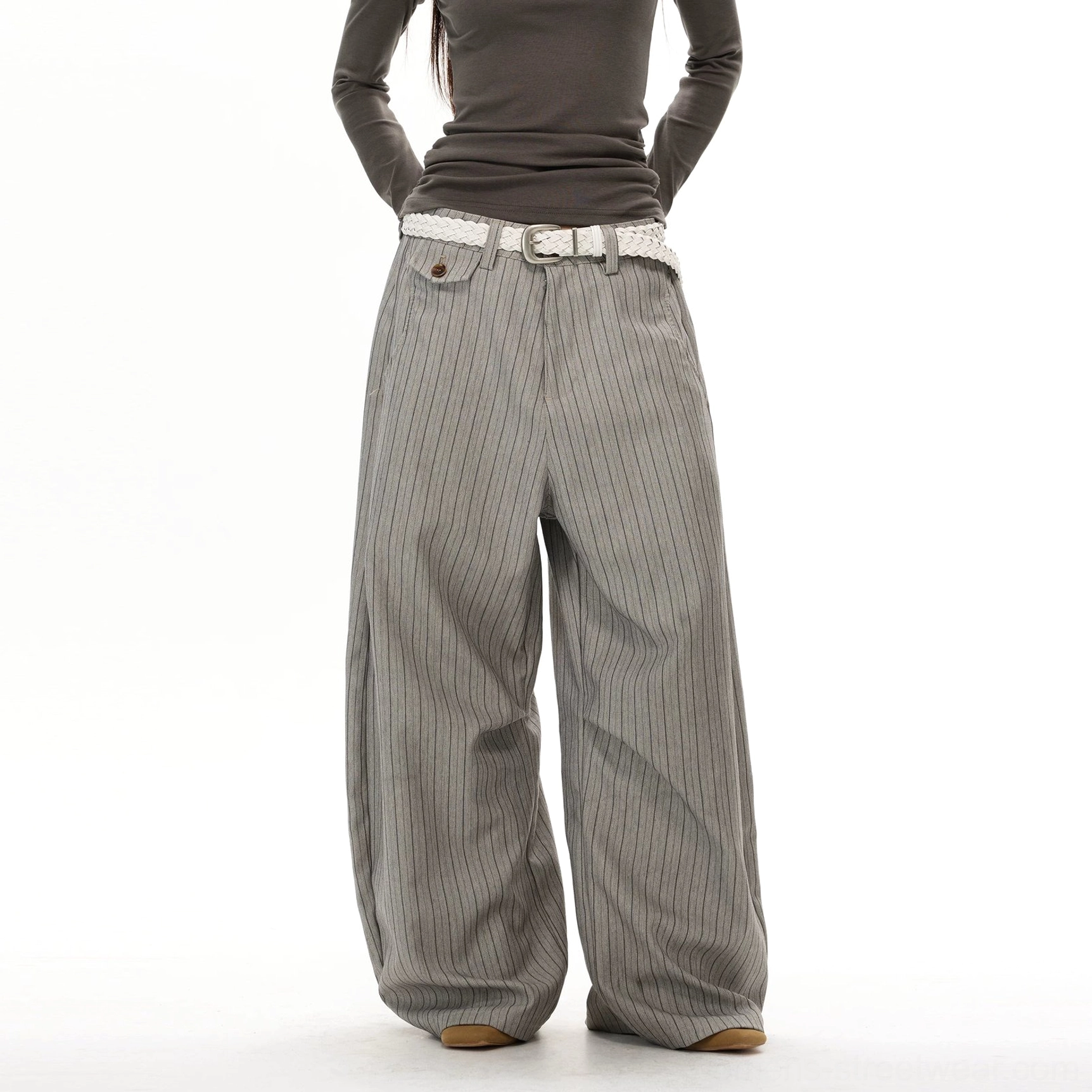 Gray pinstripe oversized wide-leg trousers front view featuring buttoned flap coin pocket and soft draped legs