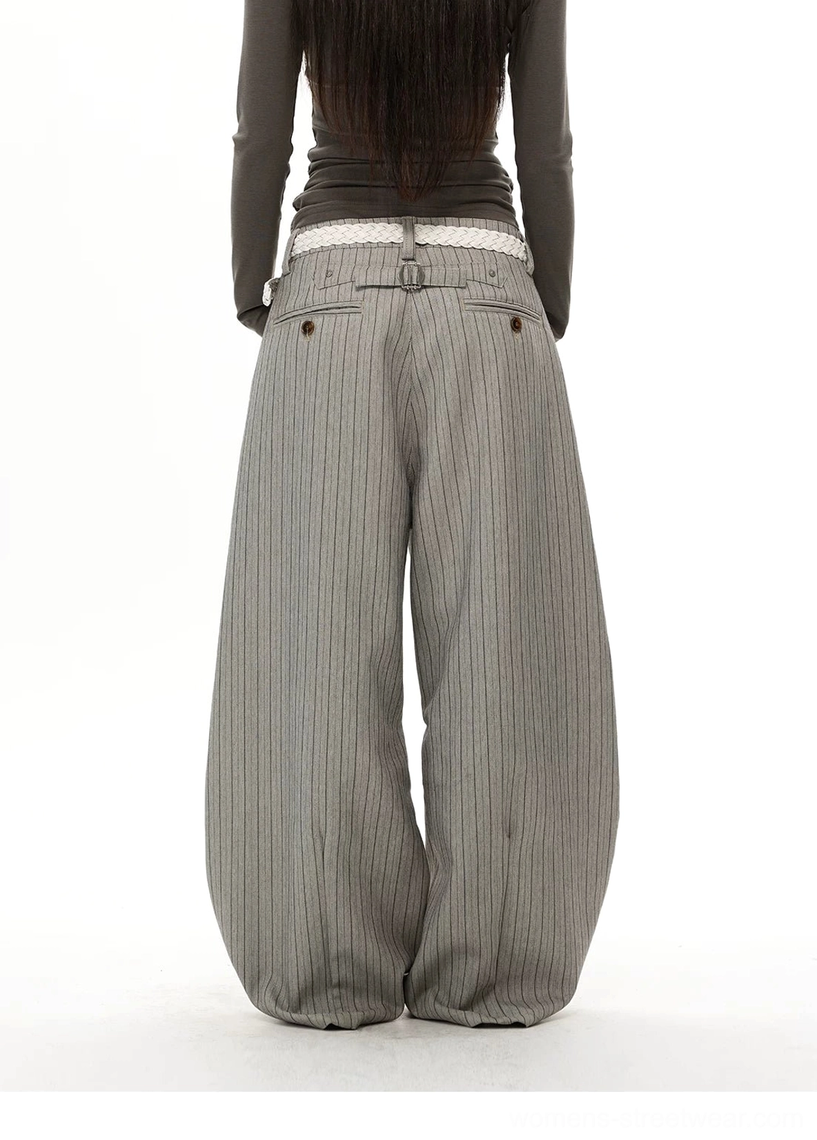 Rear view of gray pinstripe wide-leg streetwear trousers showing high back waistband and rear welt pockets