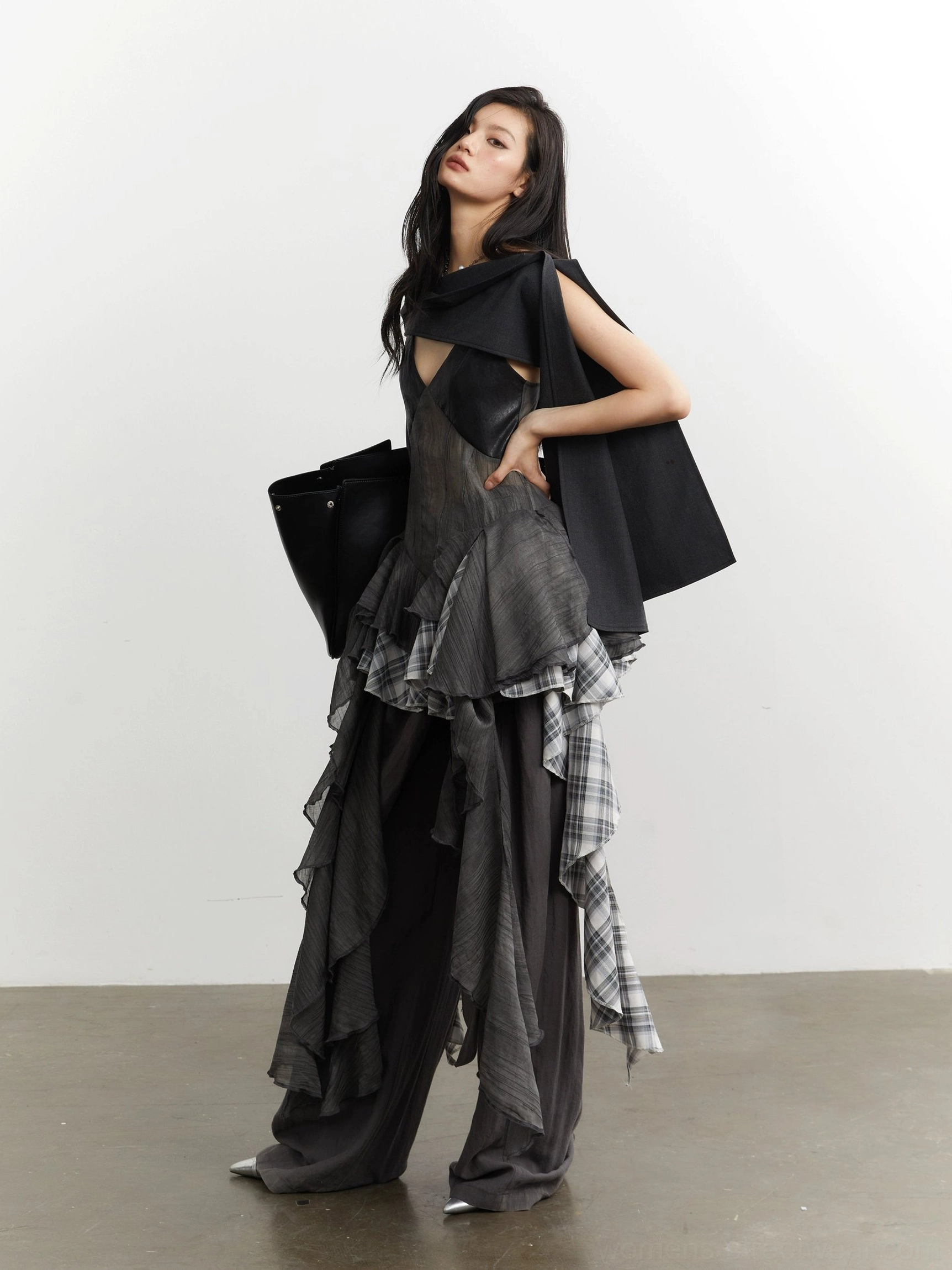 Side view of gray plaid ruffle deconstructed mesh camisole top showing off shoulder drape and asymmetric layered details