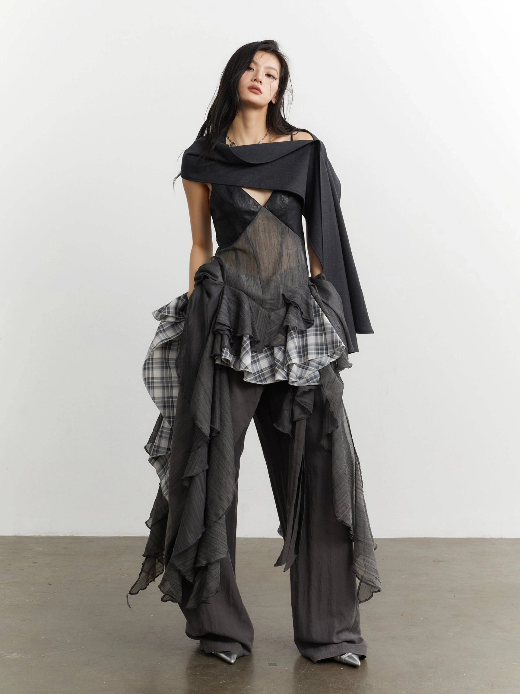 Gray plaid ruffle sheer mesh deconstructed camisole top styled in a full front studio look with asymmetric layered hem