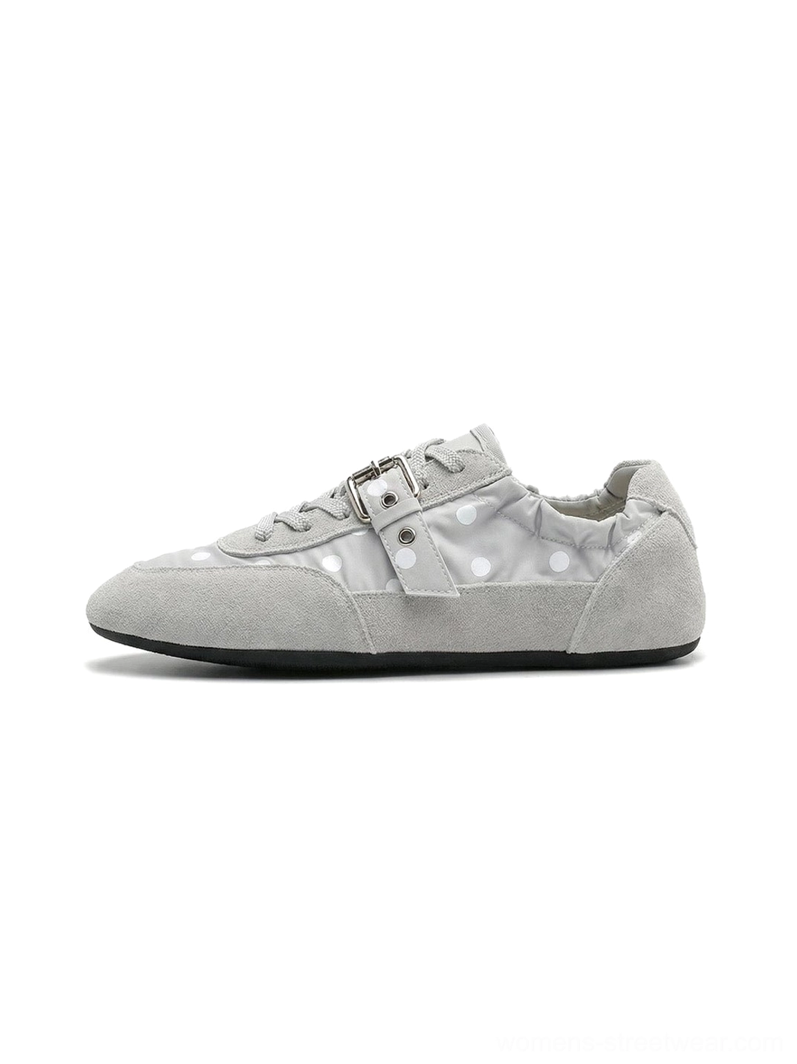 Gray low-profile polka dot ballet sneakers with white dots, silver buckle strap, suede-look toe cap, and heel trim