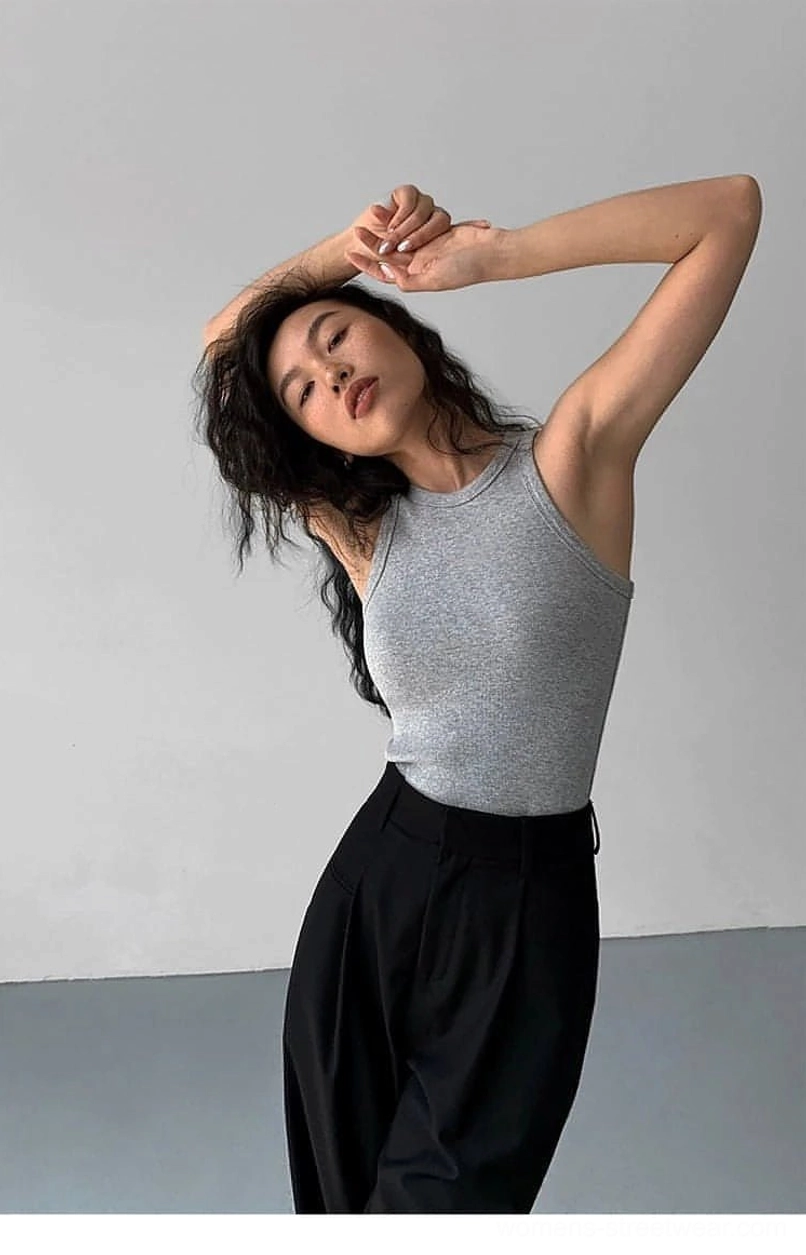 Gray ribbed knit tank top paired with matching neutral outfits showcasing versatile layering potential