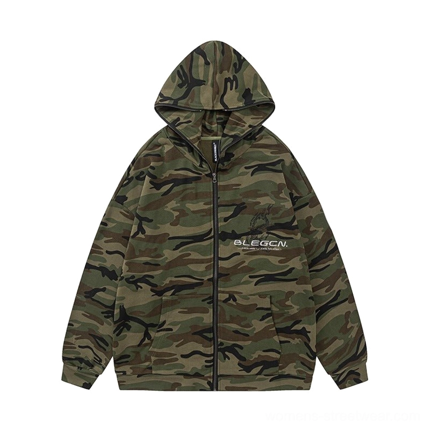 Flat lay of oversized green army camouflage zip-up fleece jacket with full zipper, hood, chest detail, and drop shoulder design