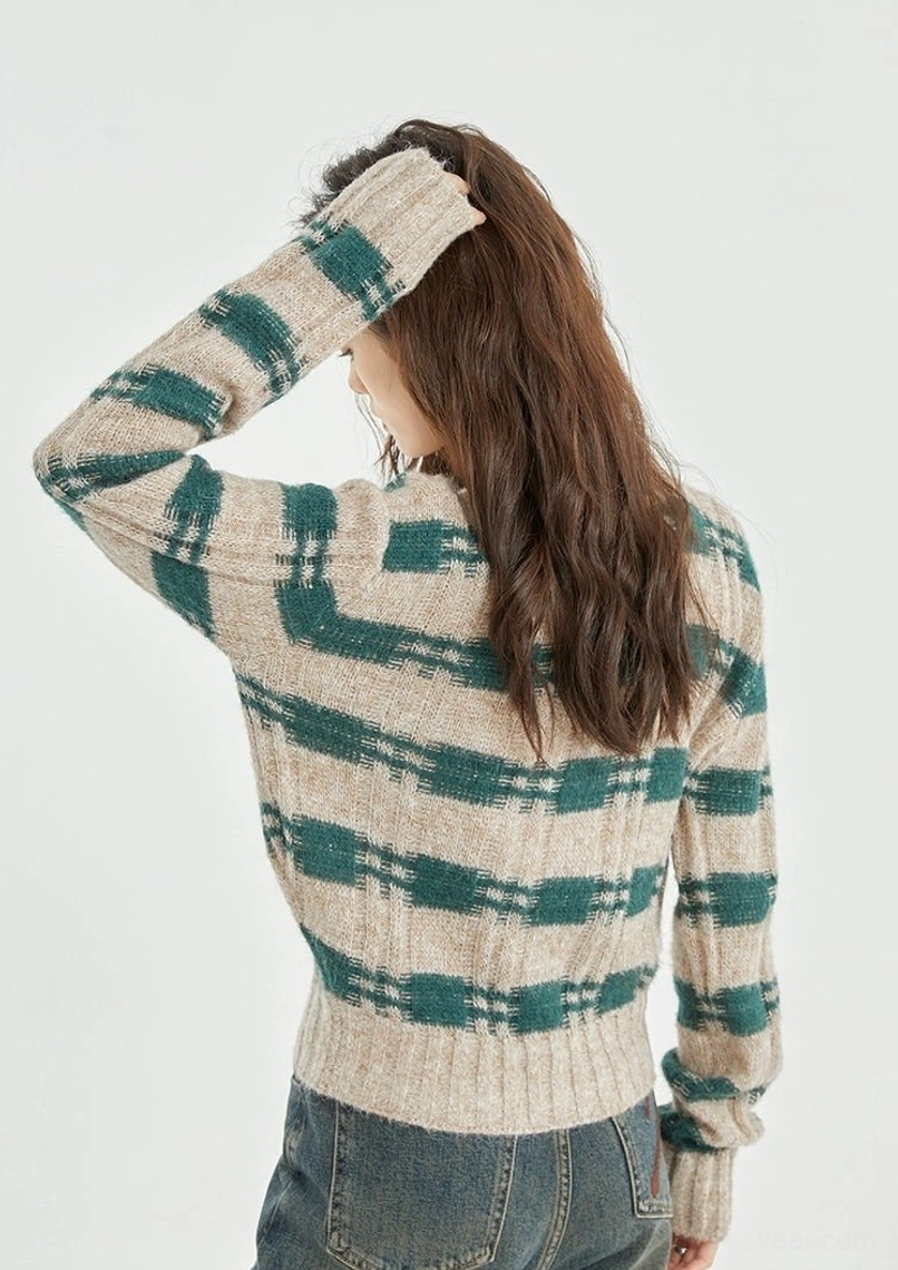 Back view of green beige plaid cropped knit cardigan showing all over plaid pattern ribbed sleeves and hem