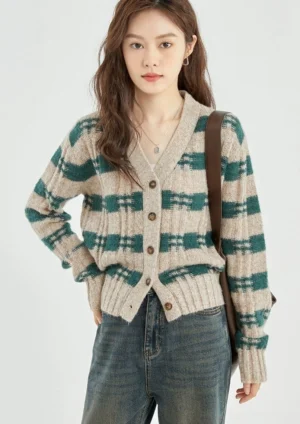 Green beige plaid cropped knit cardigan front view styled with high waisted jeans and brown shoulder tote bag