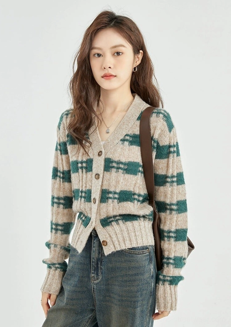 Full front view of green beige plaid cropped knit cardigan styled as a Korean streetwear layer with jeans