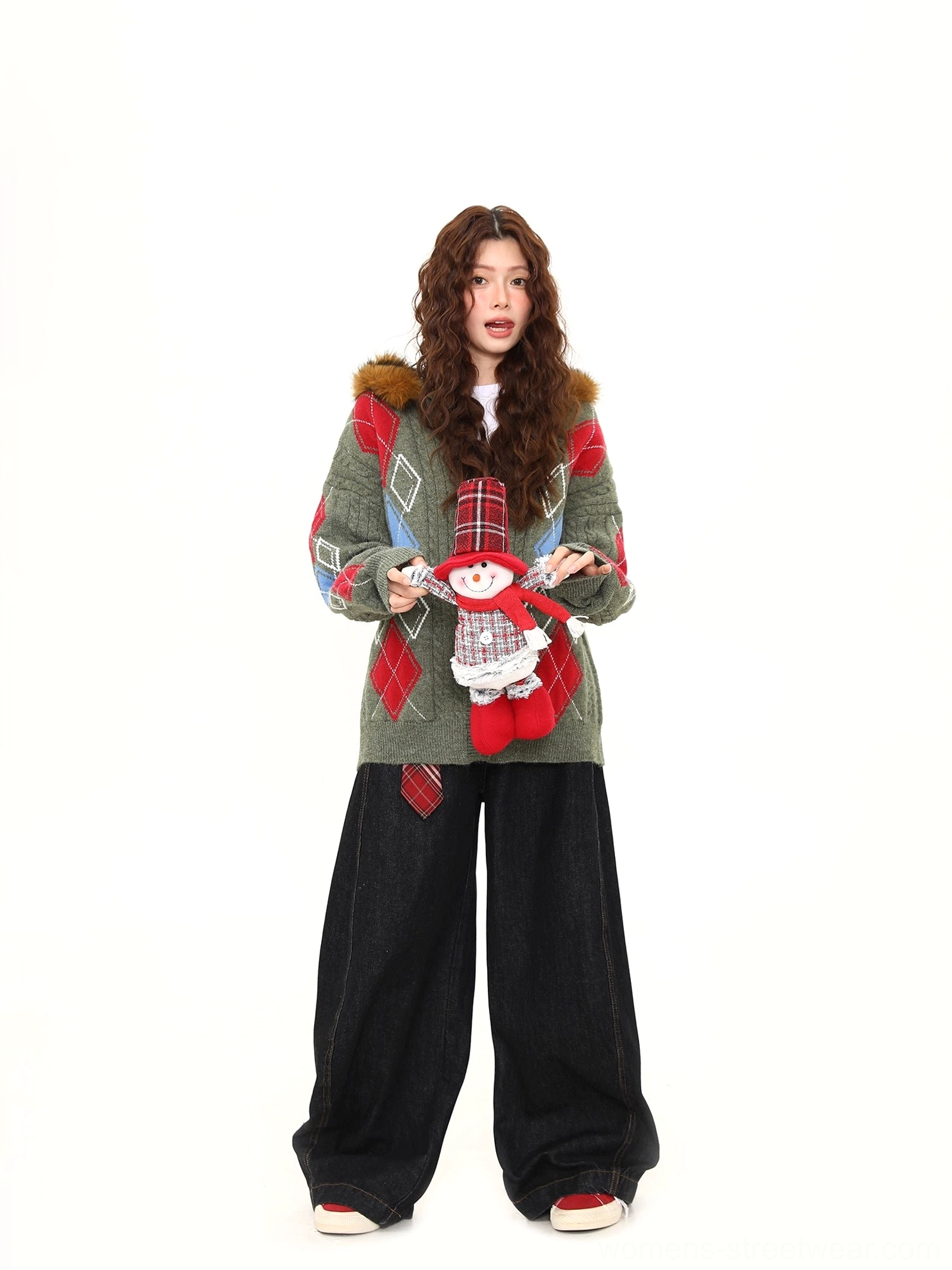 Green faux fur hood argyle cable knit oversized cardigan front view styled with black wide leg jeans