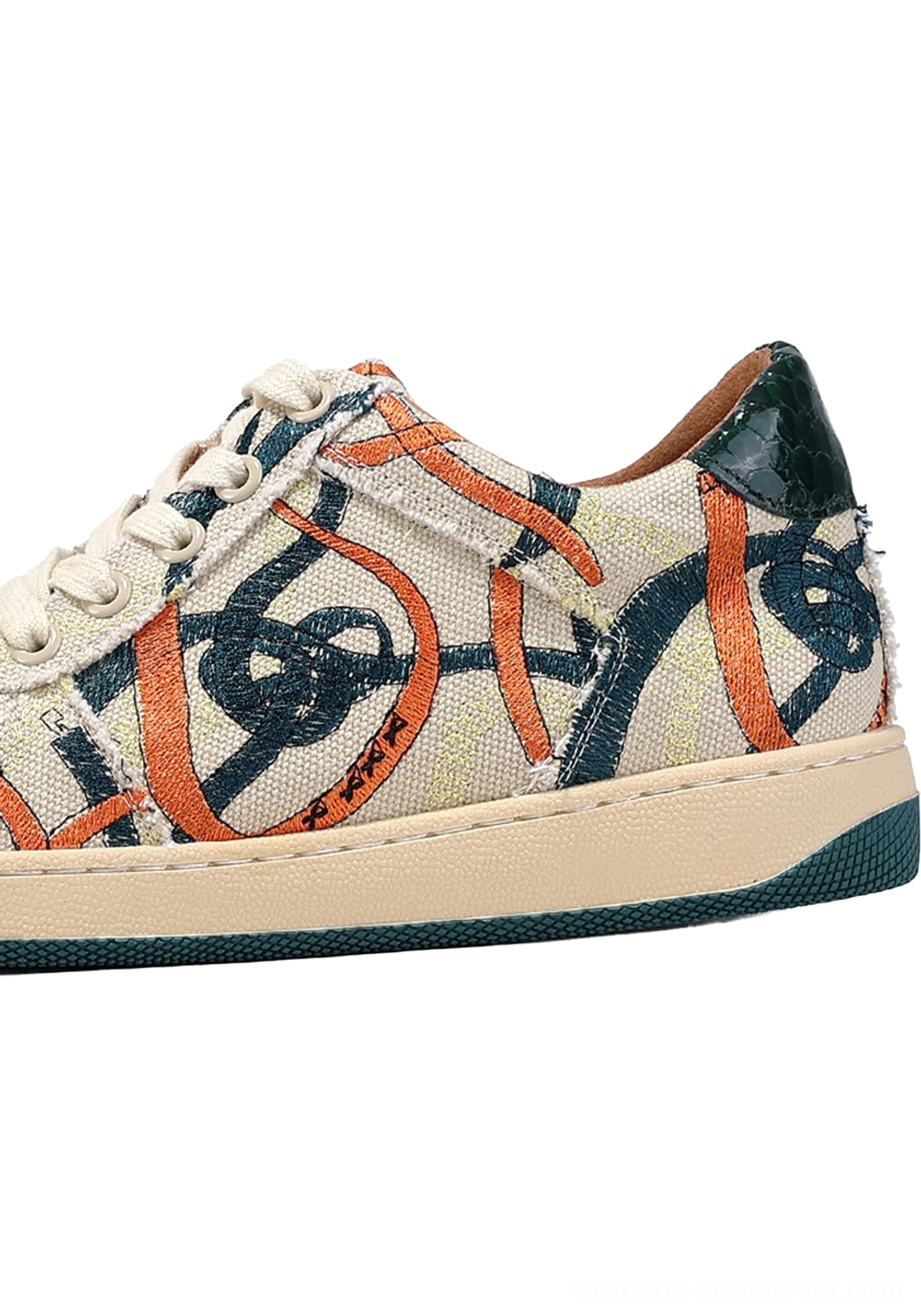 Green sole graffiti canvas low-top streetwear sneaker rear side view showing illustrated side panel heel tab and layered rubber outsole