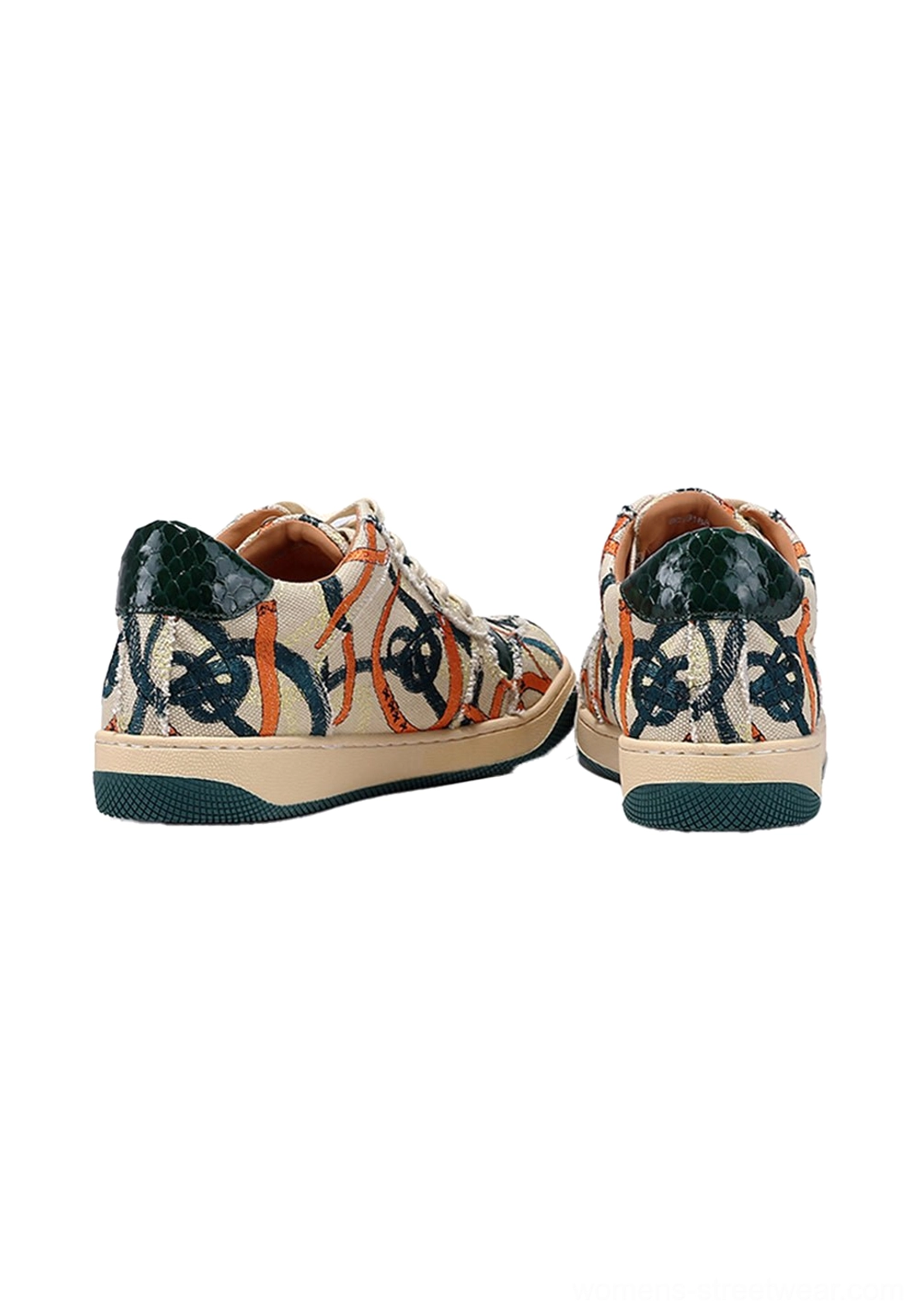 Rear view of green sole graffiti canvas low-top streetwear sneakers with dark green heel tabs and printed canvas panels