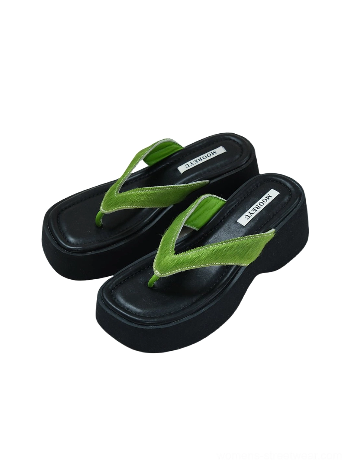 Top view of green suede strap black platform flip-flops displayed as a pair