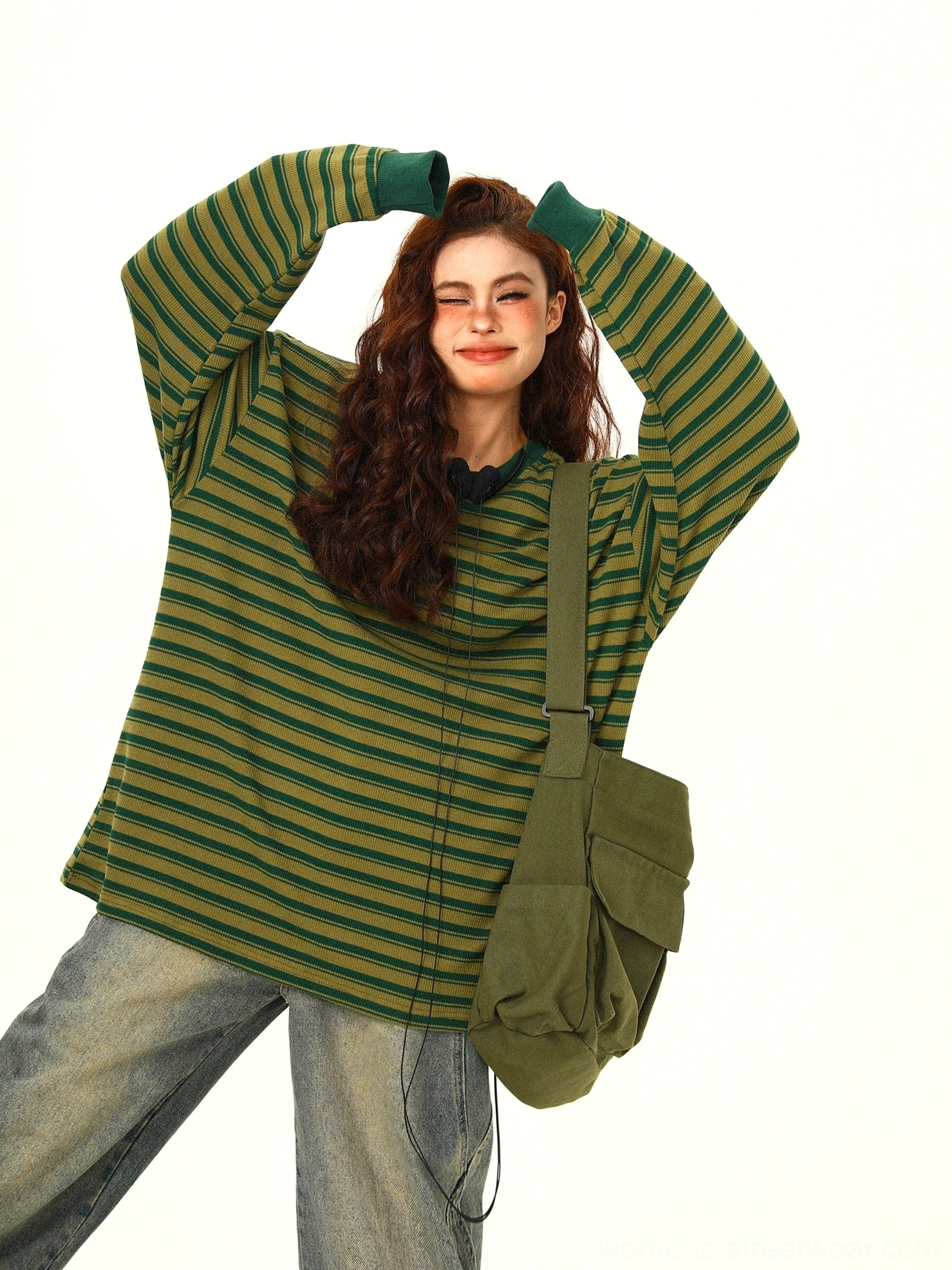 Green and yellow striped oversized long sleeve tee with adjustable drawstring hem styled in a Korean streetwear outfit