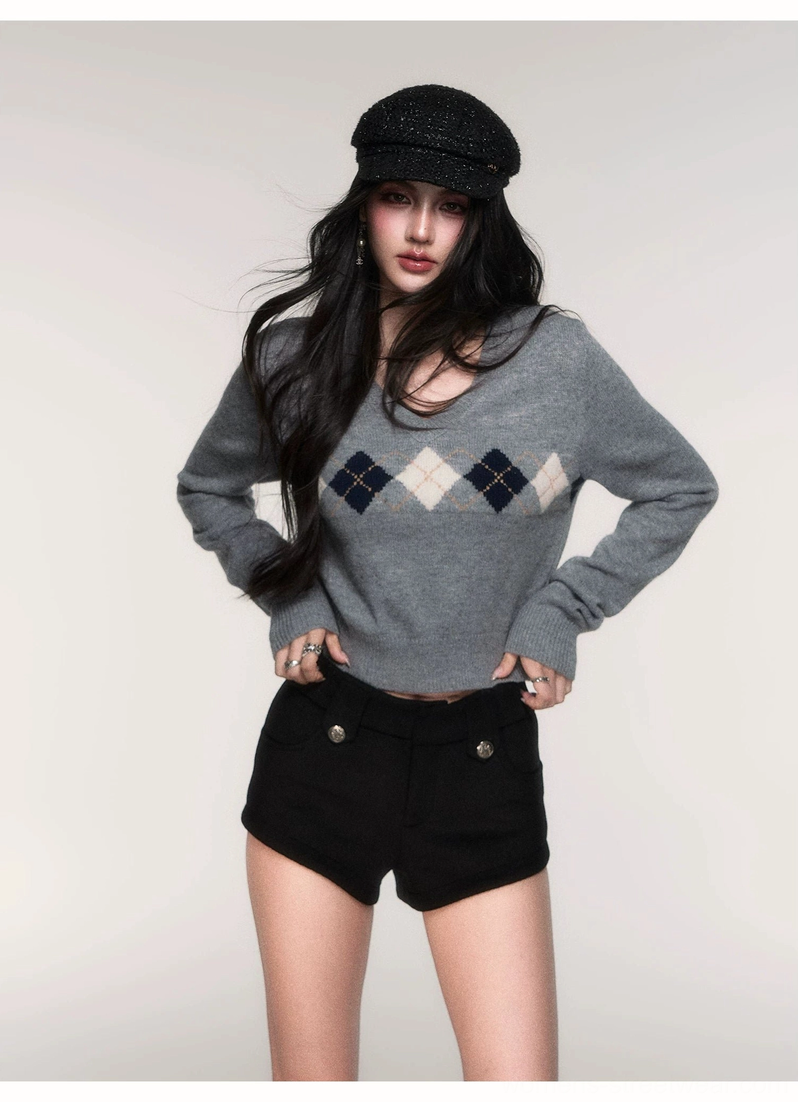 Grey argyle cropped knit sweater for women showing navy cream diamonds ribbed hem and long sleeve details