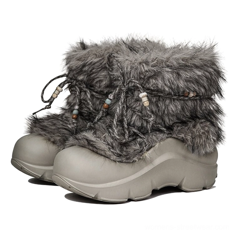 Pair of grey faux fur platform snow boots with brown-tipped texture, matte grey soles, and matching beaded drawstrings
