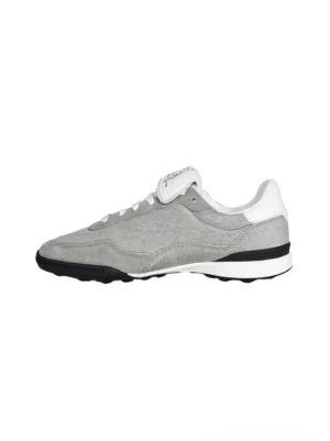 Grey fur-lined platform sneakers rear three-quarter view with white heel accent and chunky black rubber sole