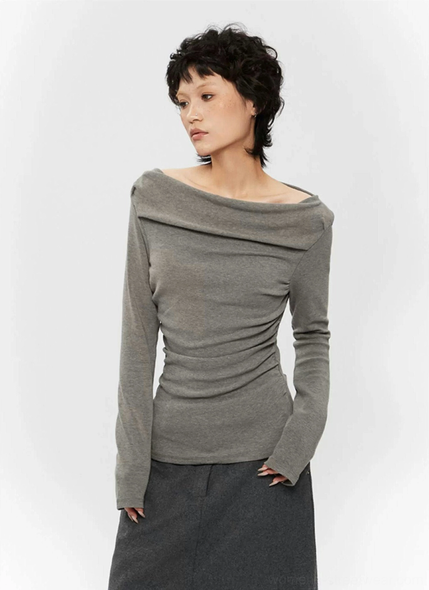 Grey off-shoulder ruched long-sleeve top with draped neckline and fitted Korean streetwear styling