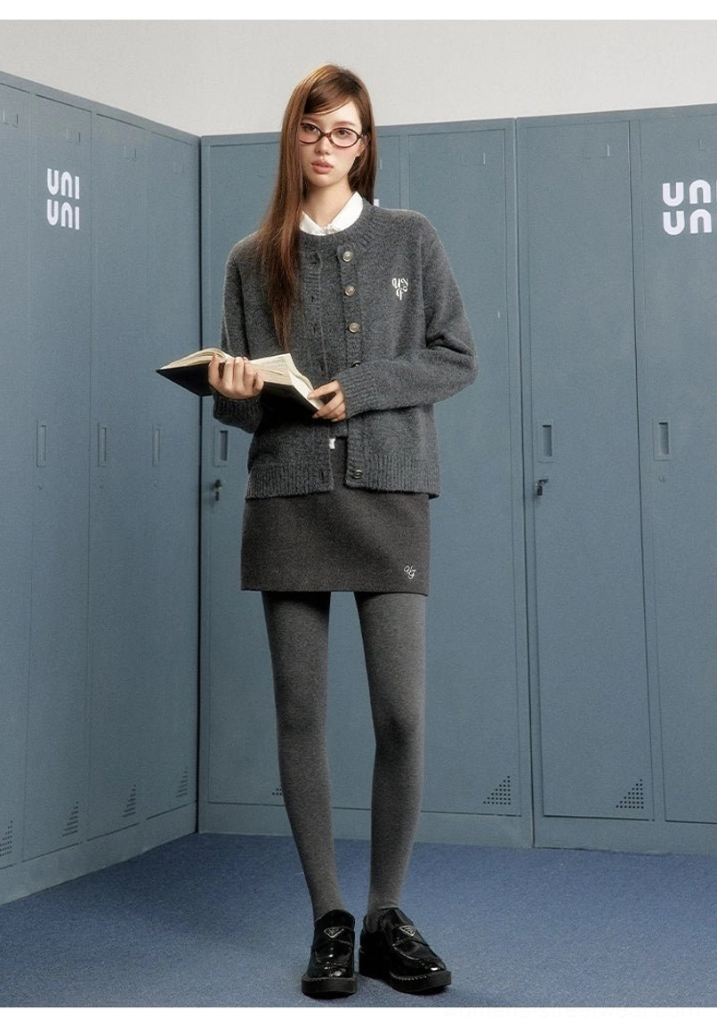 Grey wool-look mini skirt styled with cardigan, tights, and loafers in a coordinated Korean preppy college outfit