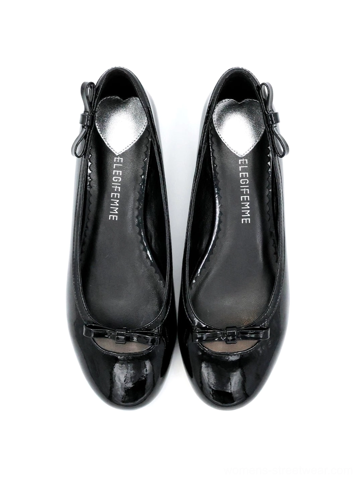 Black glossy patent ballet flats shown from above with rounded closed toe, delicate vamp bow, heart-inspired insole shape, and feminine Y2K streetwear design