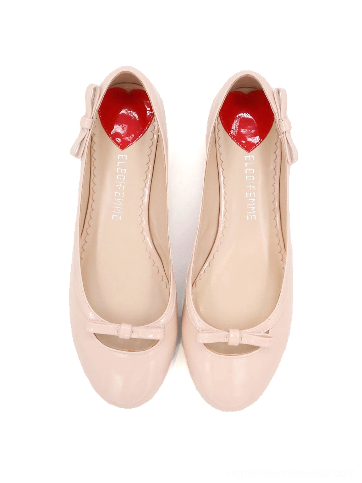 Heart-back patent ballet flats with glossy rounded toe, feminine bow ornament, low-profile flat sole, and modern Korean streetwear aesthetic