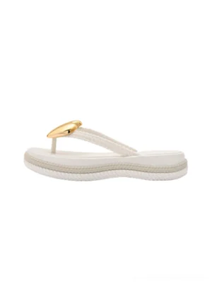 White heart wave platform flip-flops with glossy gold heart toe accent, braided midsole trim, and thick cushioned sole