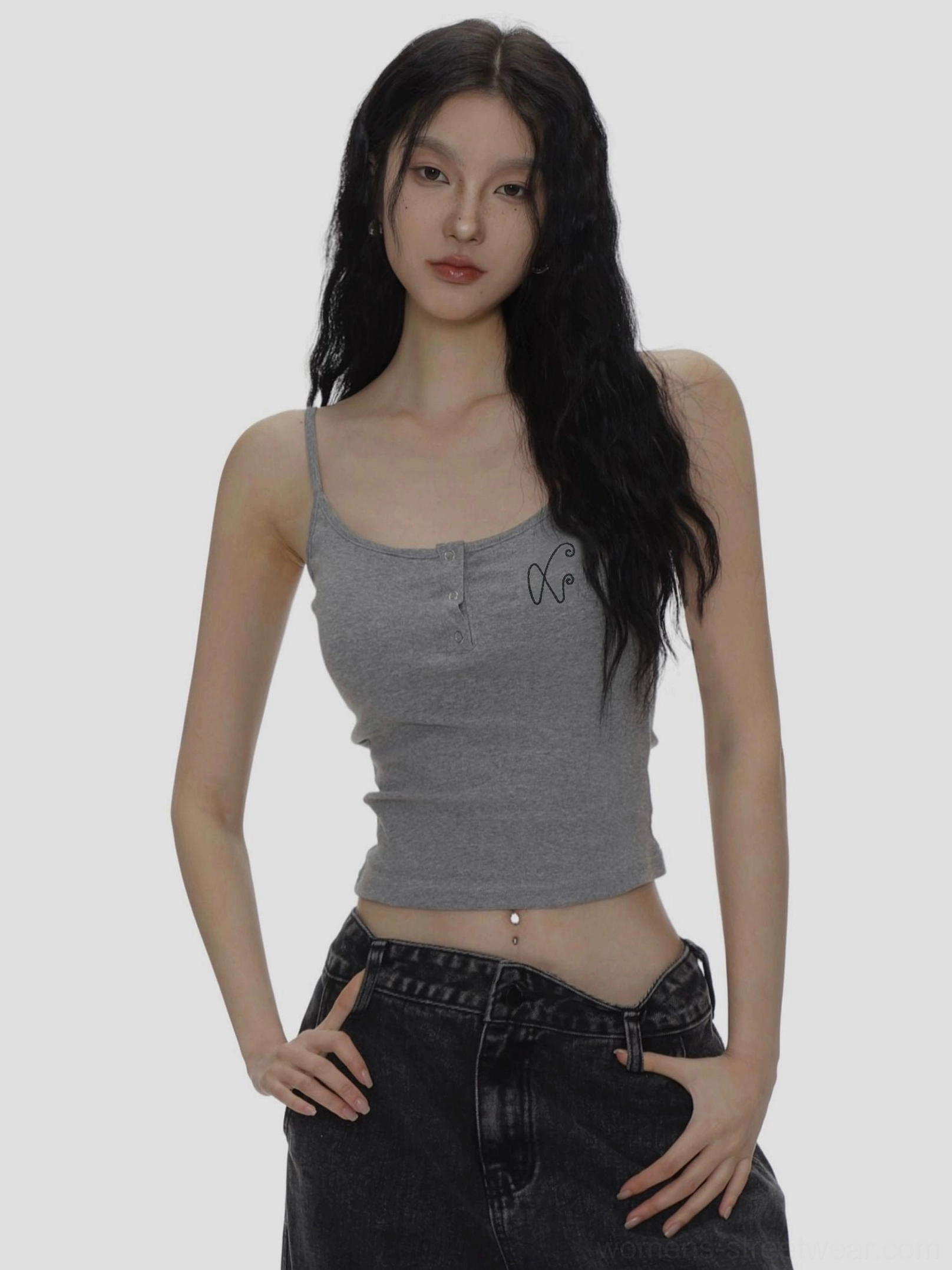 Heather gray cropped spaghetti strap camisole with subtle XO embroidery and fitted silhouette paired with black denim