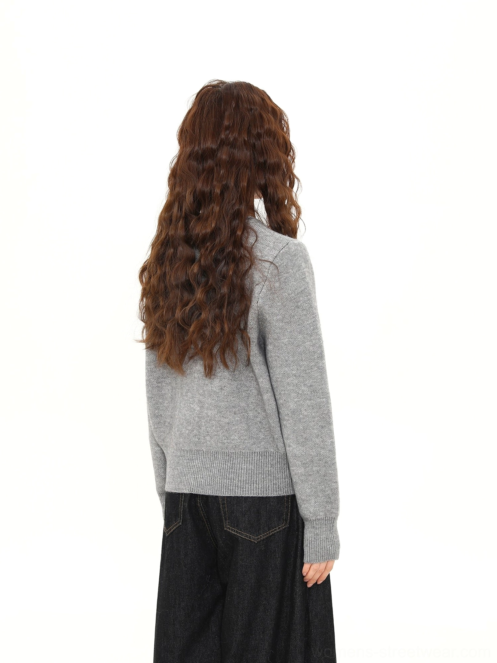 Back view of a heather gray knit cardigan showing the plain back panel, relaxed straight silhouette, and coordinated ribbed neckline, cuffs, and hem