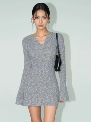 Heather gray Korean streetwear knit mini dress styled with long flared bell sleeves and black leather shoulder bag