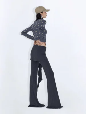 Heather gray low rise wrap drape flare streetwear pants shown from the side with a hanging asymmetric waist tie and slim flared leg