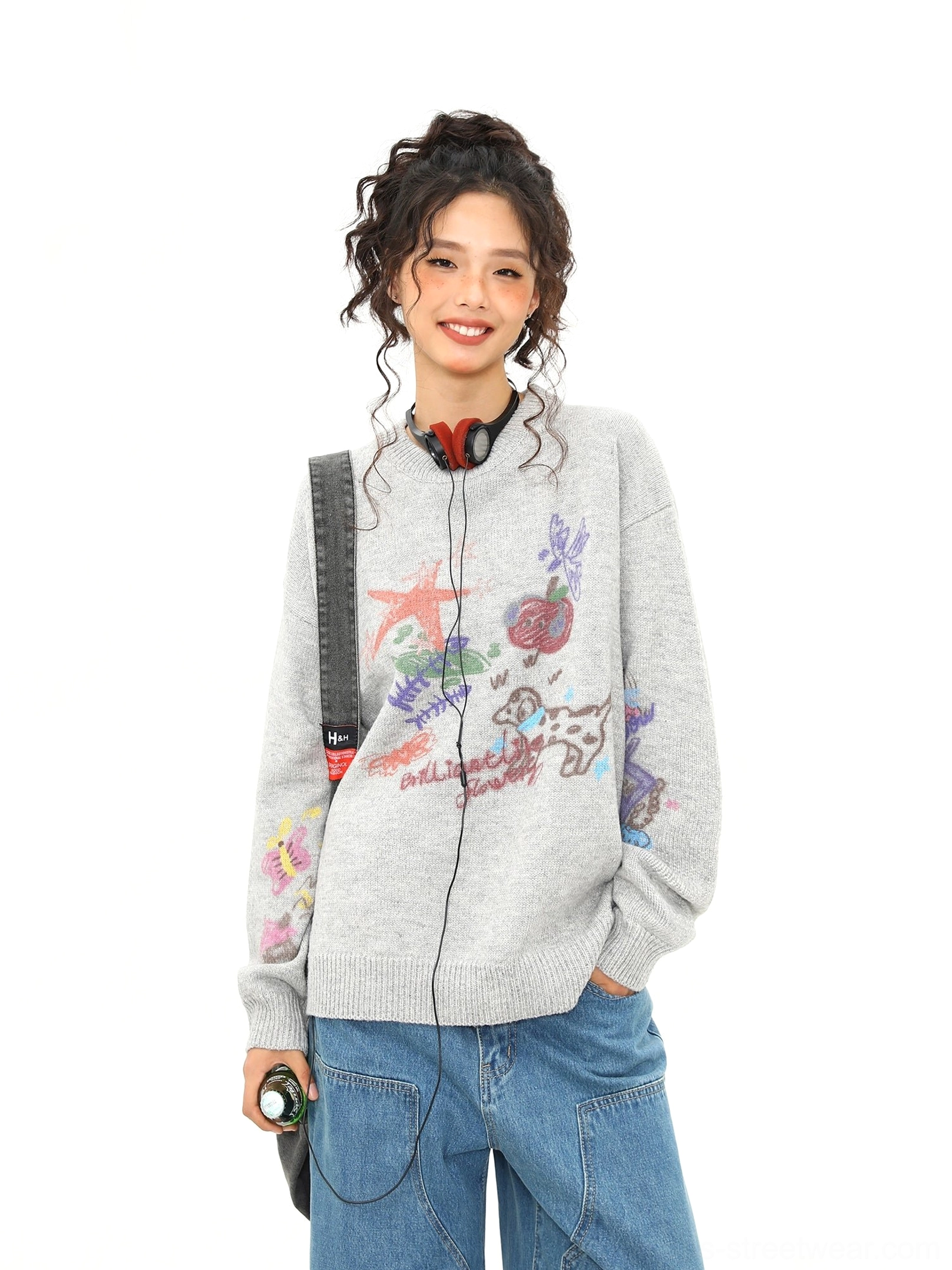 Oversized heather gray doodle knit sweater front view featuring colorful puppy starfish and handwritten cartoon graphics