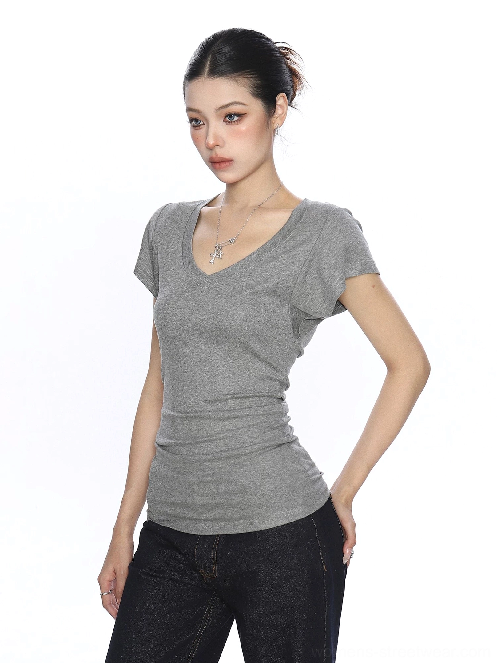 Heather gray slim V-neck ruched short-sleeve T-shirt styled with dark wide-leg jeans in a Korean fashion look