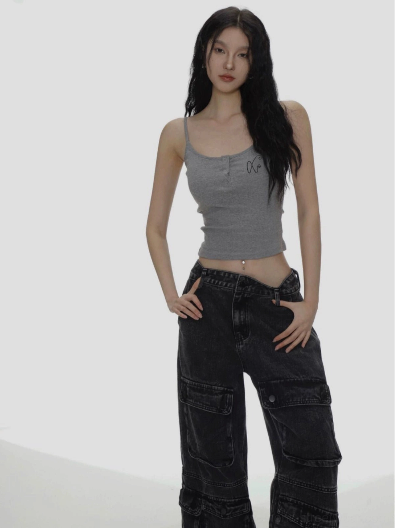 Heather gray fitted spaghetti strap camisole with XO chest embroidery styled with black cargo jeans in a Korean streetwear outfit
