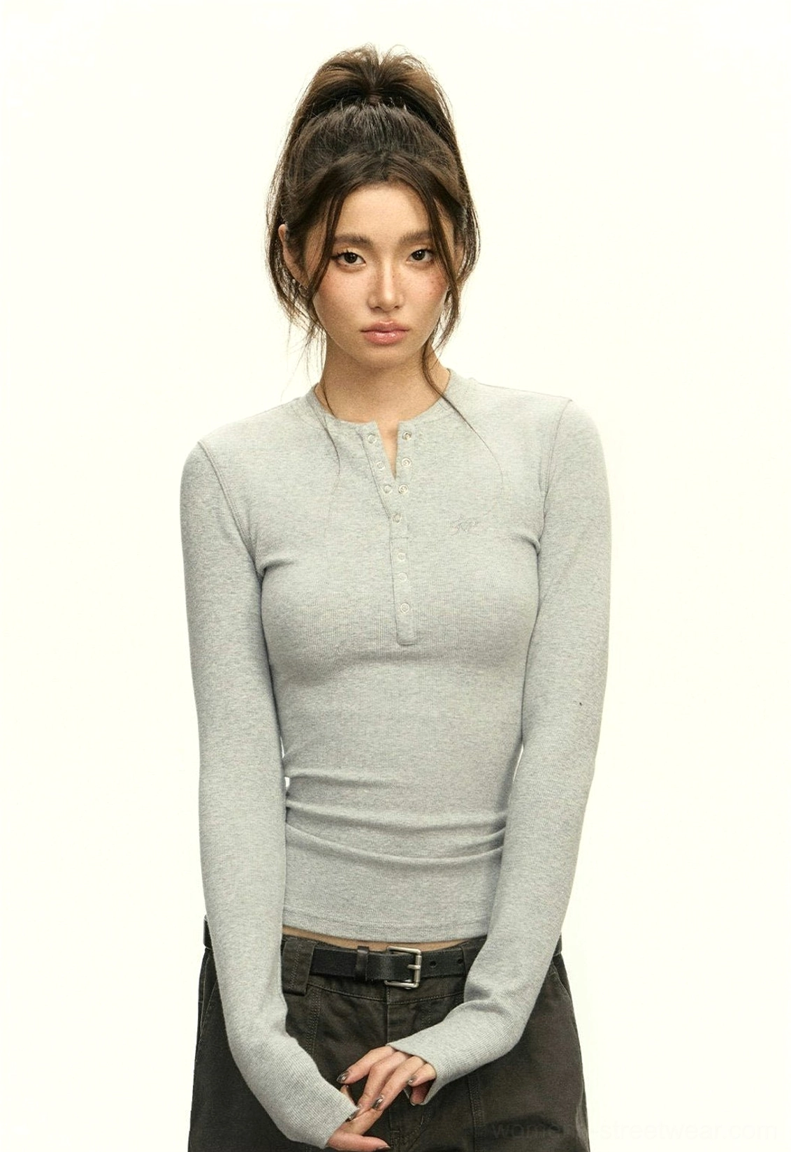 Heather grey fitted ribbed Henley crop top with long sleeves and button placket styled with dark trousers