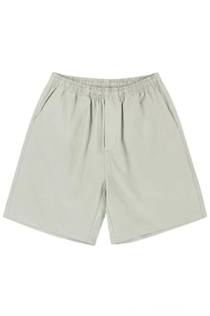 Light khaki heavyweight cotton streetwear shorts with elastic waist and relaxed straight-leg beach fit shown from the front