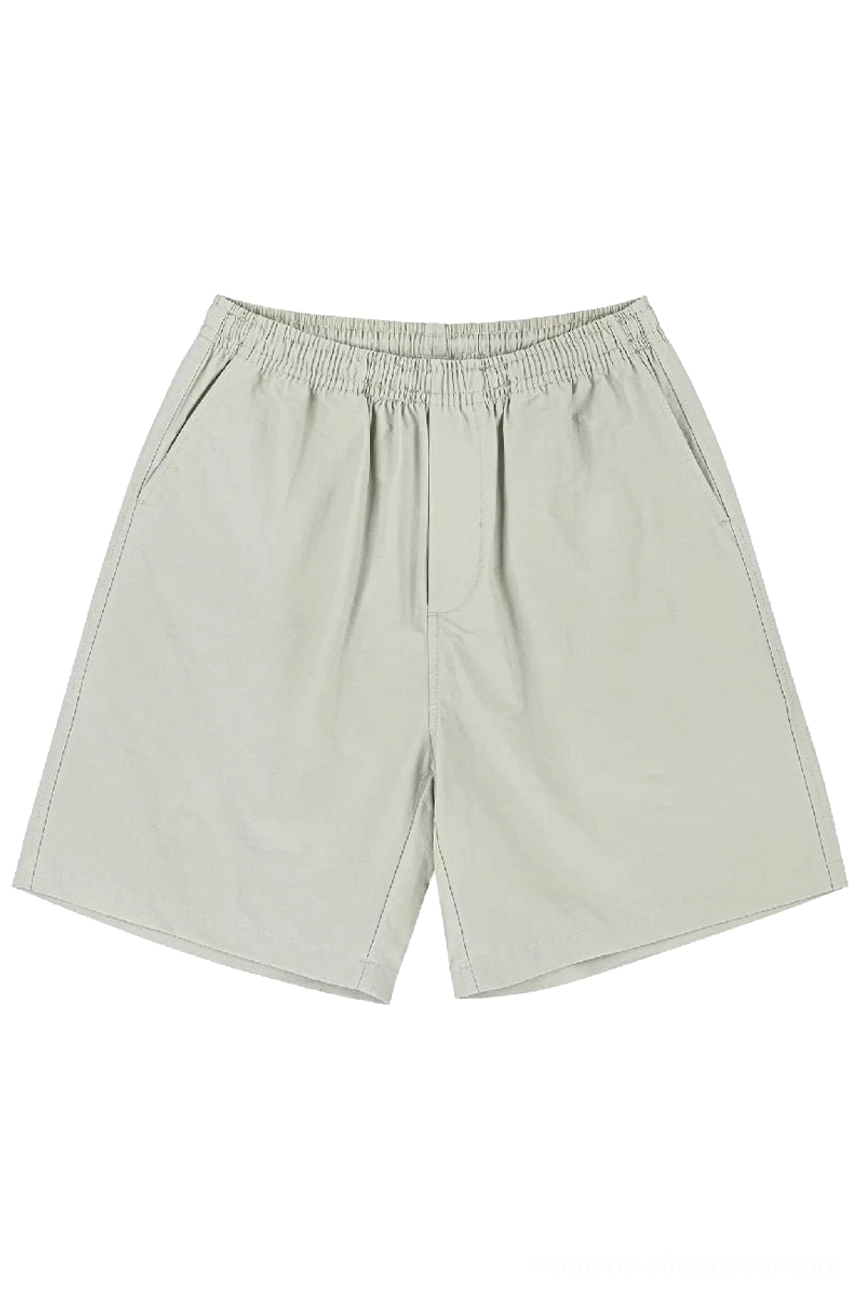 Light khaki heavyweight cotton streetwear shorts with elastic waist and relaxed straight-leg beach fit shown from the front