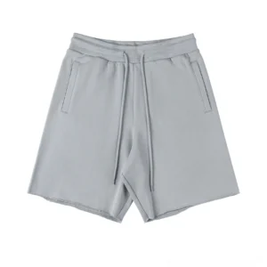 Light gray heavyweight raw hem drawstring sweat shorts front view with relaxed oversized silhouette