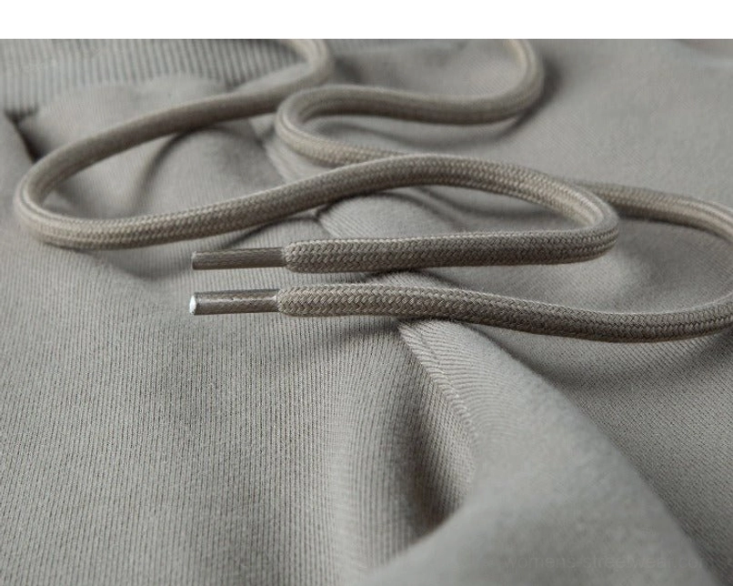 Braided drawcord with metal tips on heavyweight raw hem drawstring sweat shorts