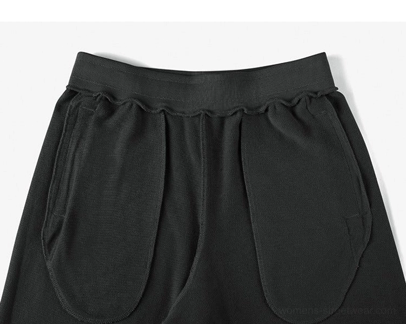 Raw hem drawstring sweat shorts versatile neutral streetwear styling image