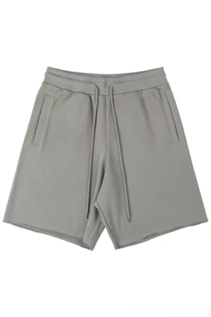 Taupe gray heavyweight raw hem drawstring sweat shorts front flat lay with elastic waist and side pockets