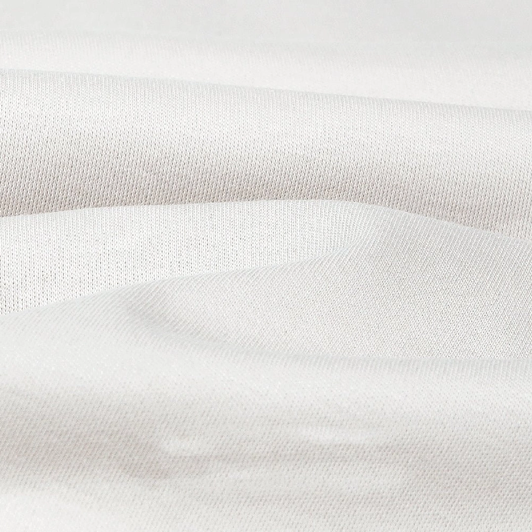 Close-up of smooth dense 320 GSM cotton fabric with silk finish for oversized streetwear tee