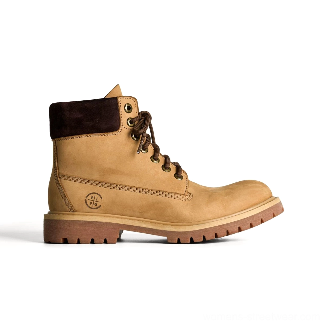 Sand wheat tan two-tone heritage leather work boot with dark brown padded collar and thick treaded lug outsole