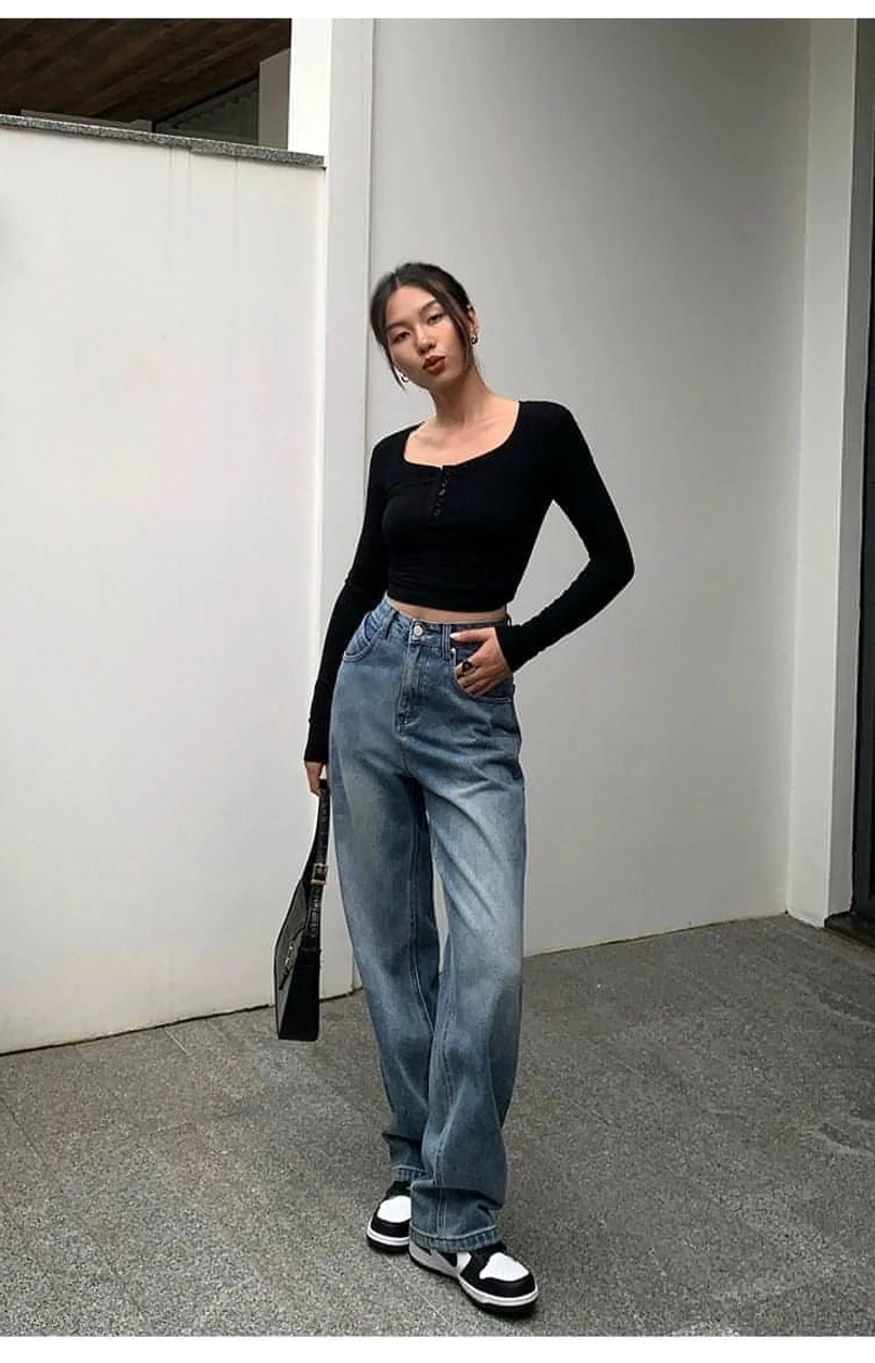 High-rise relaxed wide-leg denim jeans in faded blue for contemporary Seoul-inspired street style
