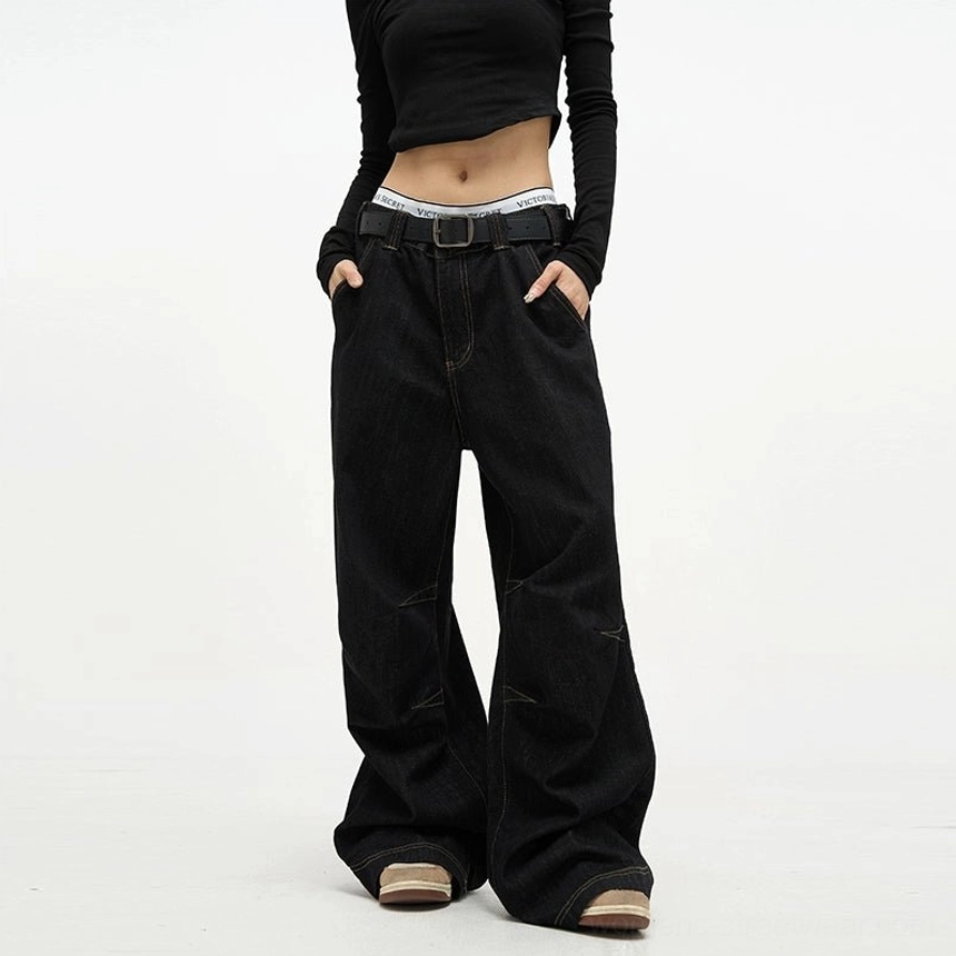 Black high waist baggy denim jeans with contrast panel seams and ultra wide relaxed streetwear fit
