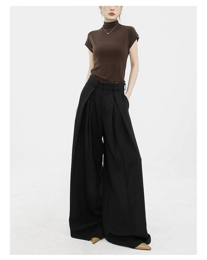 Black wide-leg palazzo streetwear pants back three-quarter view with high waist and relaxed silhouette