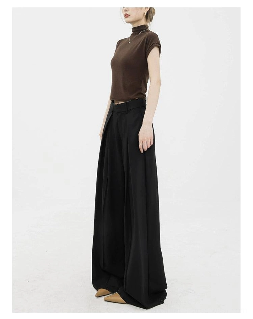 Black full-length wide-leg palazzo streetwear pants side profile with relaxed flowing fit