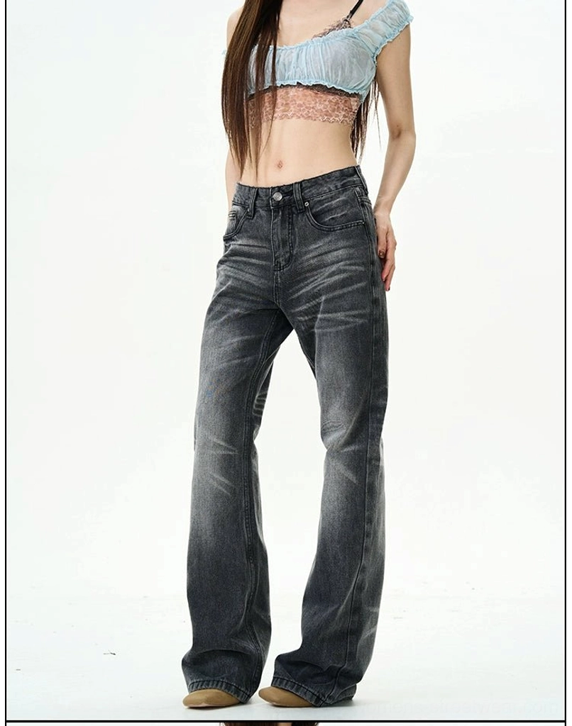 Three-quarter view of high-waisted charcoal washed jeans with relaxed straight legs and faded vintage finish