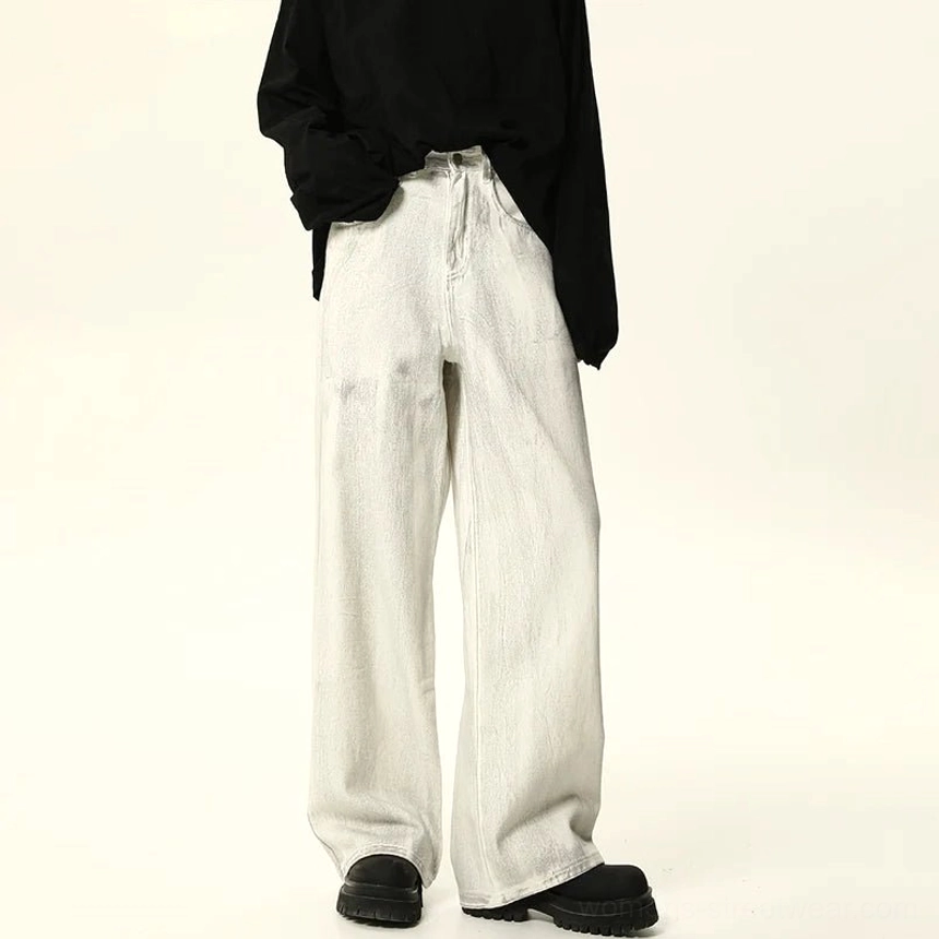 High waisted white wide leg jeans styled with a cropped black top and black platform boots for Korean streetwear fashion