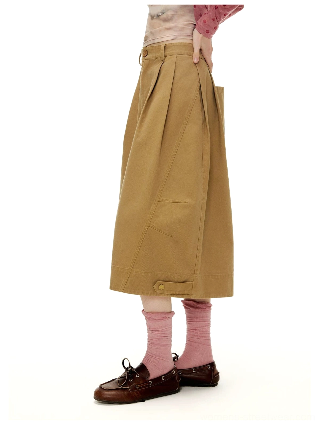 Side view of Cookie Brown washed cotton twill wide sailor culottes with pocket, pleats, and adjustable button hem tabs