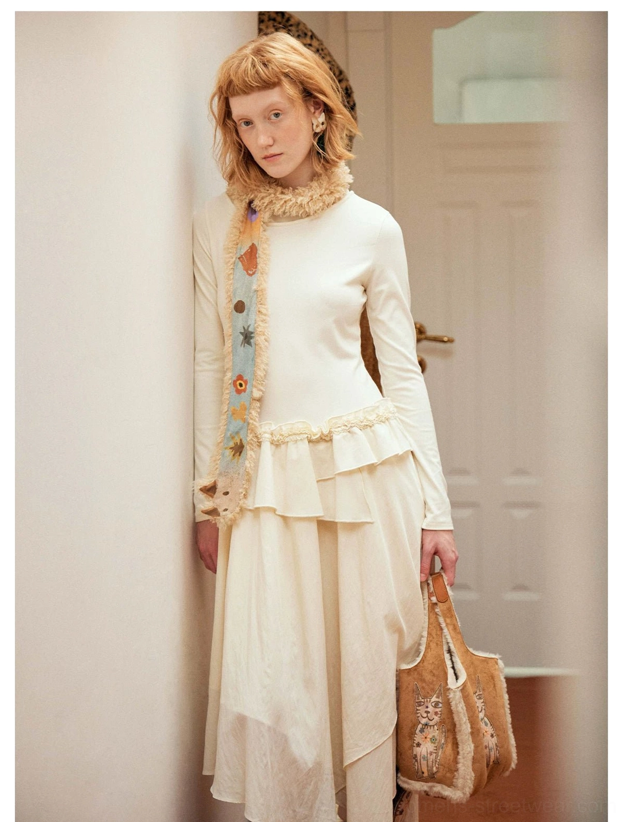 Embroidered kitty mini tote bag in honey brown faux suede with plush cream shearling trim front view