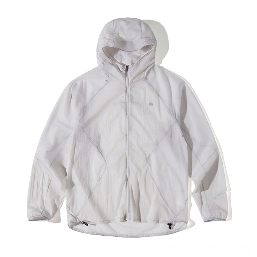 Contemporary hooded windproof jacket with lightweight crinkled texture for running, cycling, travel, and city wear